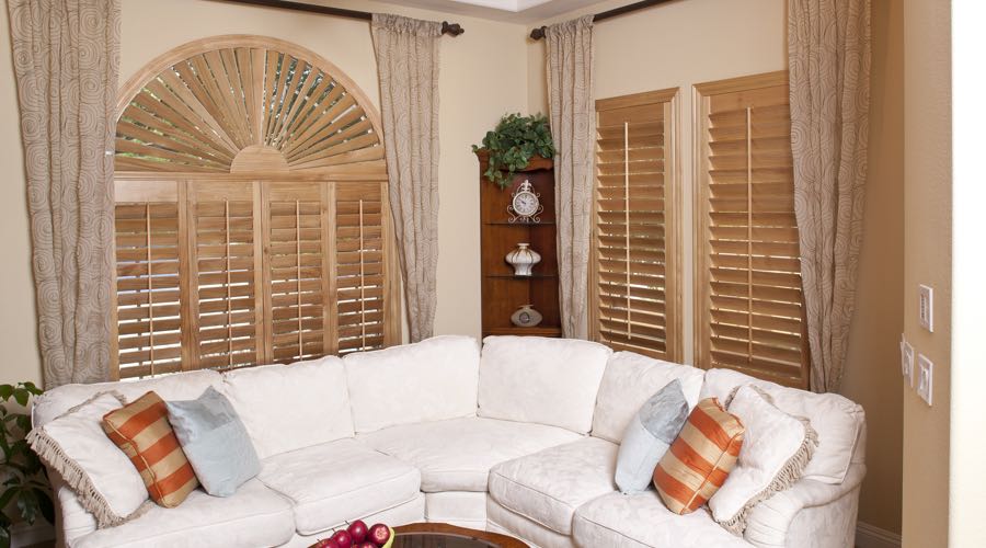 Sunburst Arch Ovation Wood Shutters In Orlando Living Room
